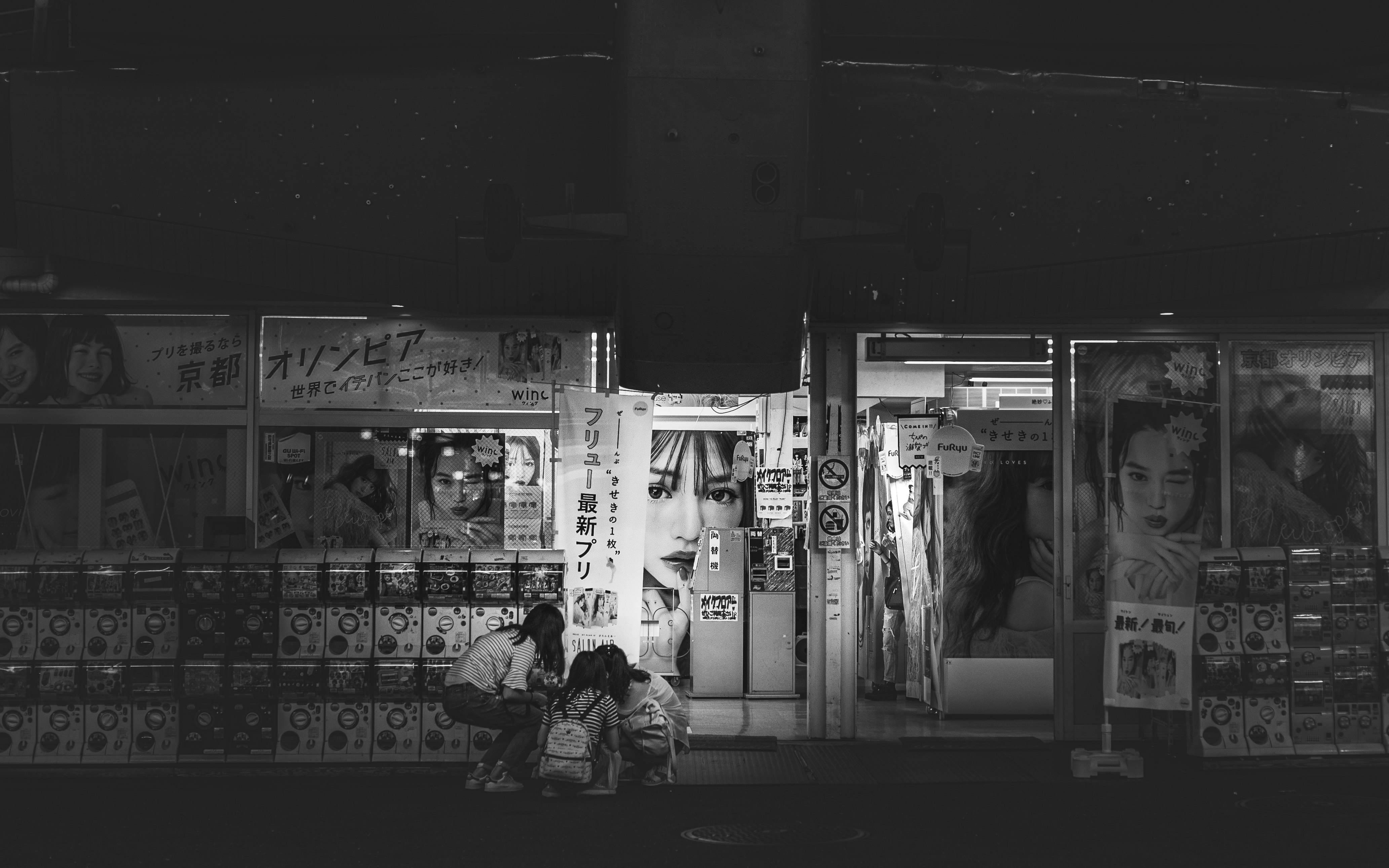 grayscale photo of people in store